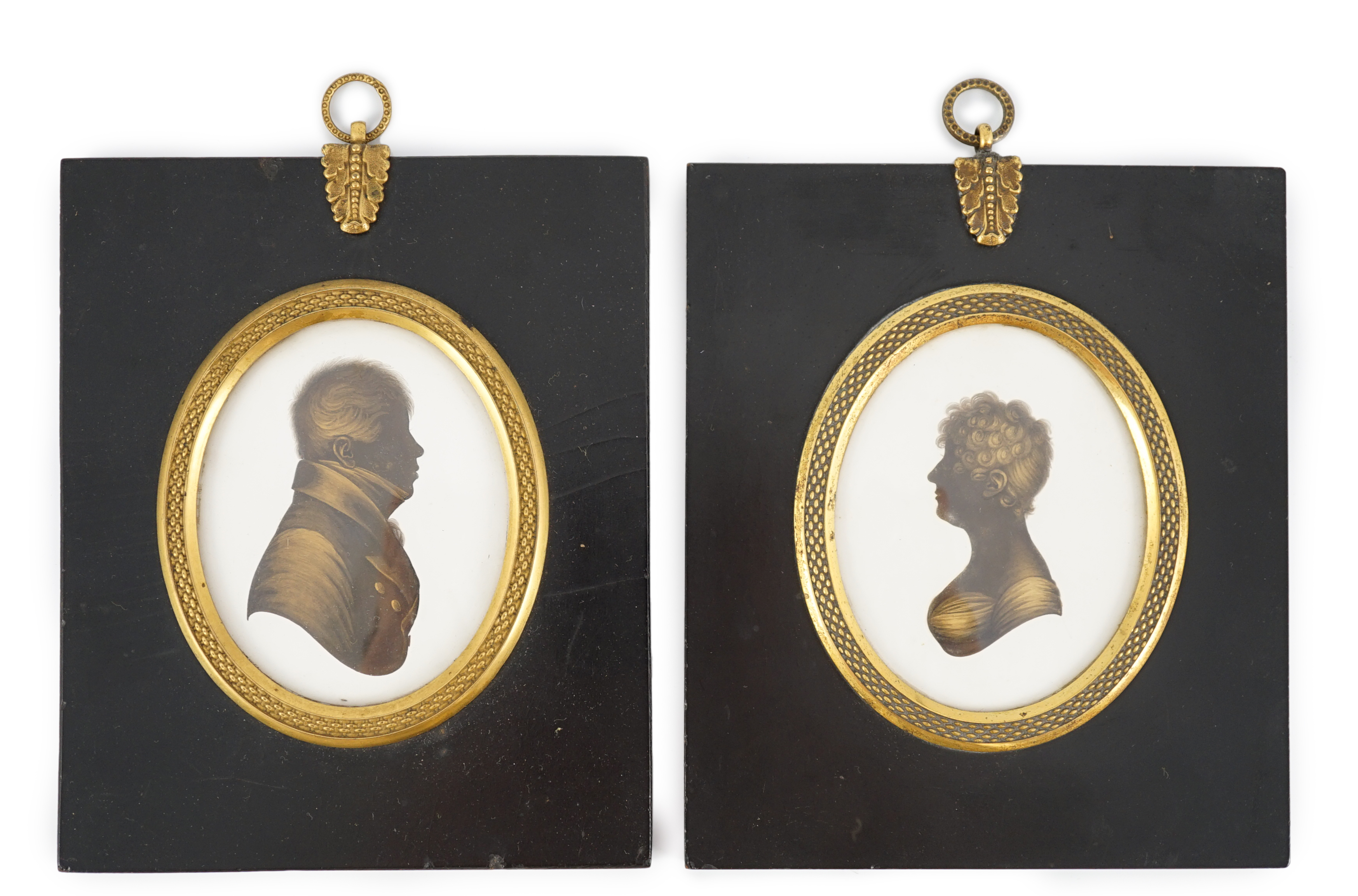 John Miers (1756-1821) and John Field (1772-1848), Silhouettes of a lady and gentleman, painted and bronzed plaster (a pair), 8 x 6.5cm.